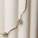 Collier Anémone en acier inoxydable plaqué or, bijou floral artisanal élégant - Flowrette