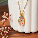 Collier Capucine en acier inoxydable plaqué or, avec des fleurs séchées, bijou floral artisanal élégant - Flowrette