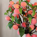 Branche de pêches artificielle, vue des tiges et des fruits de près - Flowrette