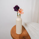 vase Ulysse : un vase bouteille en céramique blanche